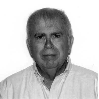 Headshot of Jim Edwards wearing a button down shirt in greyscale.
